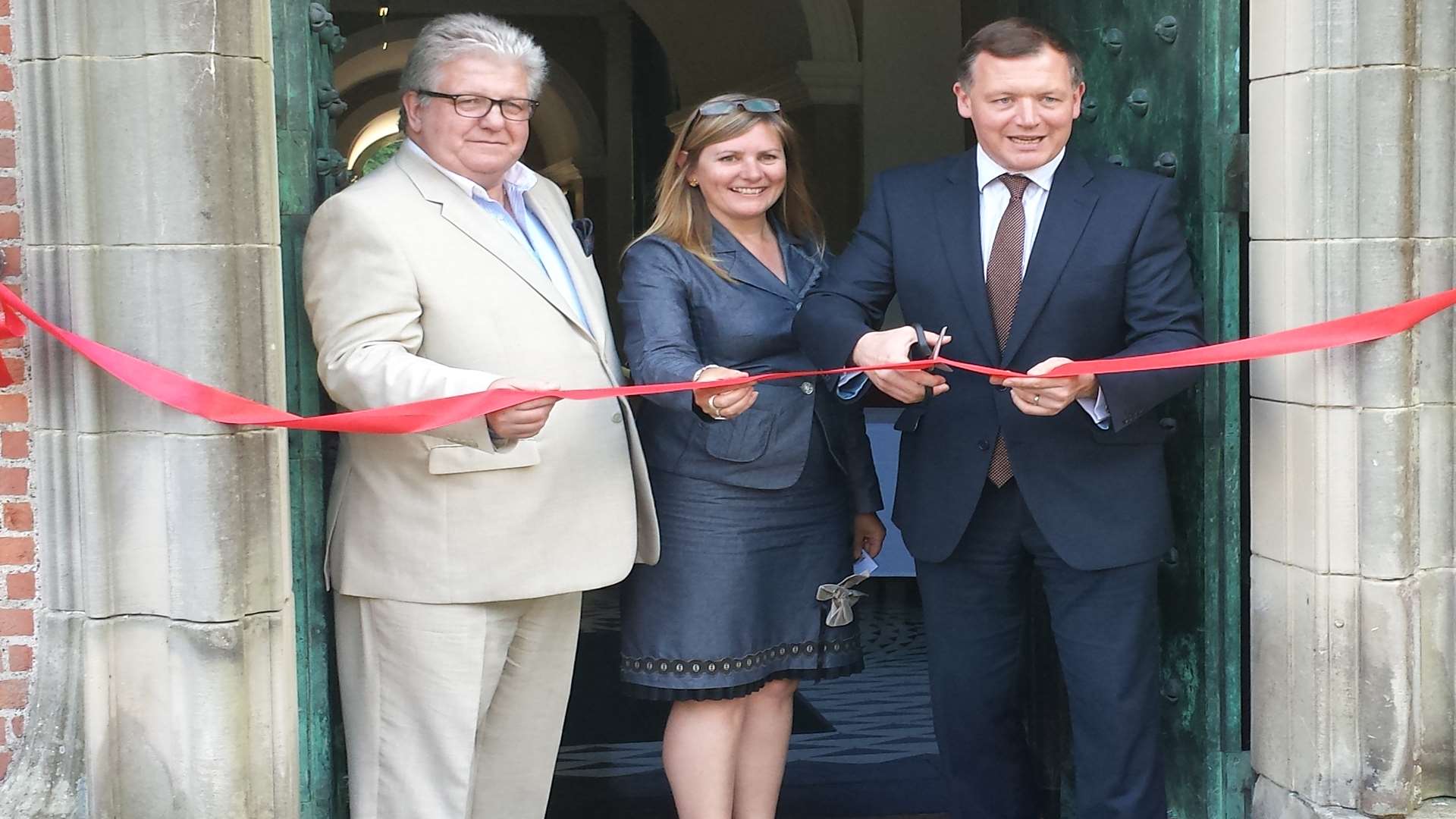 Port Lympne Mansion Hotel is opened by managing director Bob O'Connor, left, hospitality manager Sam Lloyd and Folkestone and Hythe MP Damian Collins