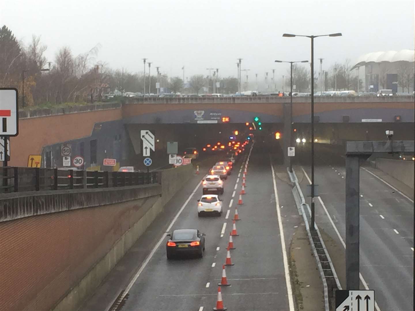There is queuing traffic after a car broke down near the Medway Tunnel