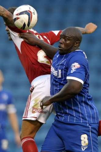 Adebayo Akinfenwa toils for Gills up front. Picture: Barry Goodwin