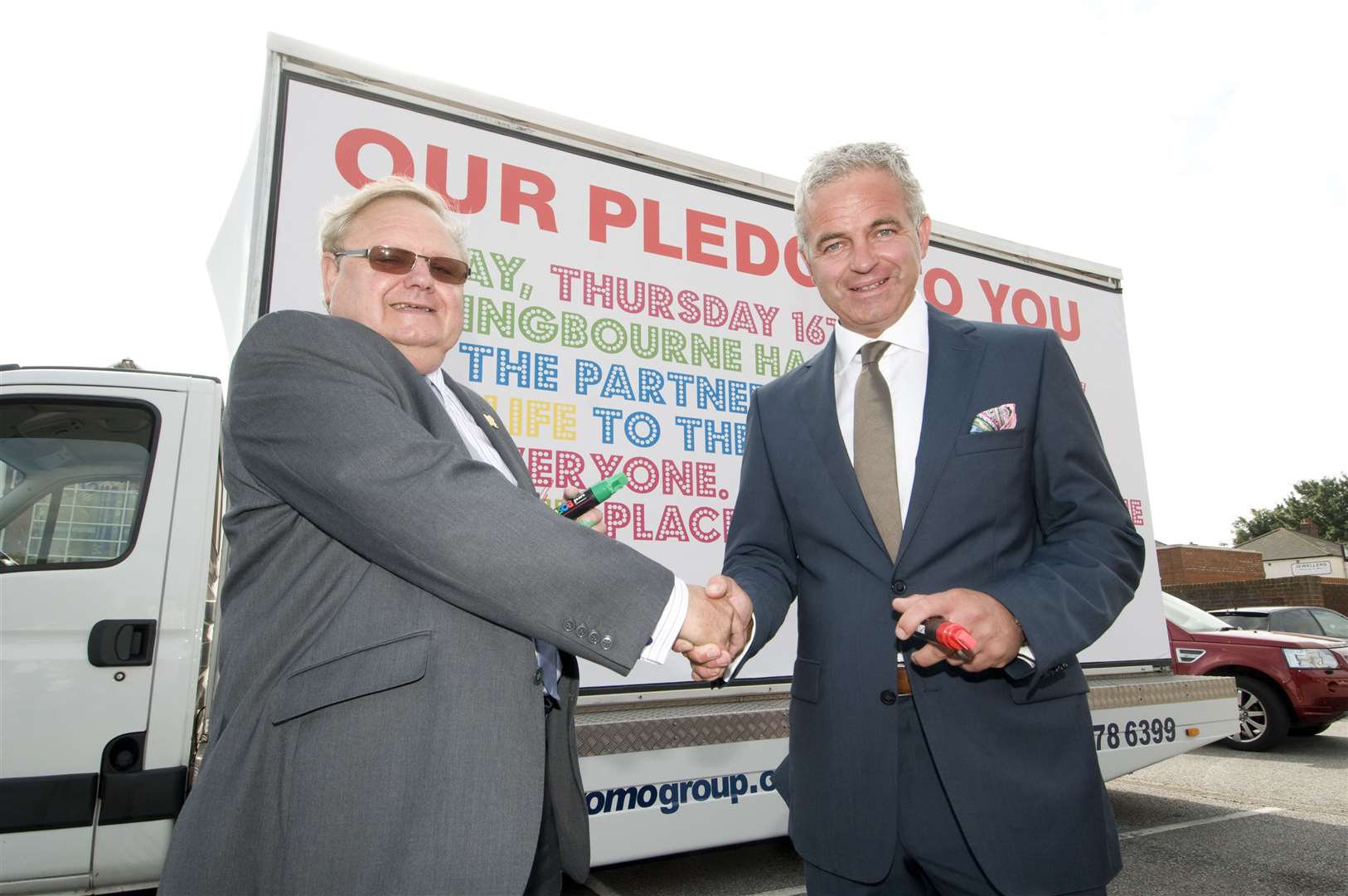 Signing of the Spirit of Sittingbourne agreement: former Swale council leader Andrew Bowles and Richard Upton from the Spirit of Sittingbourne consortium sign the "pledge" in the Forum car park in 2012. Picture: Rob Canis