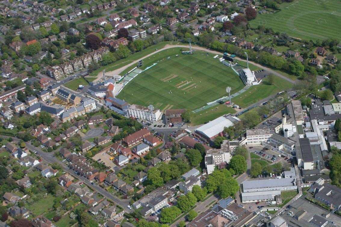 St Lawrence Ground before the last phase of redevelopment saw flats built behind the stands at the top of the picture