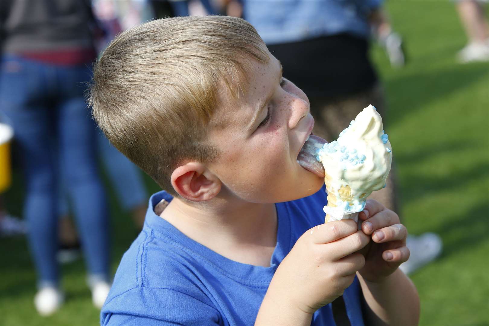 Jude Willes, 7, enjoys an ice cream