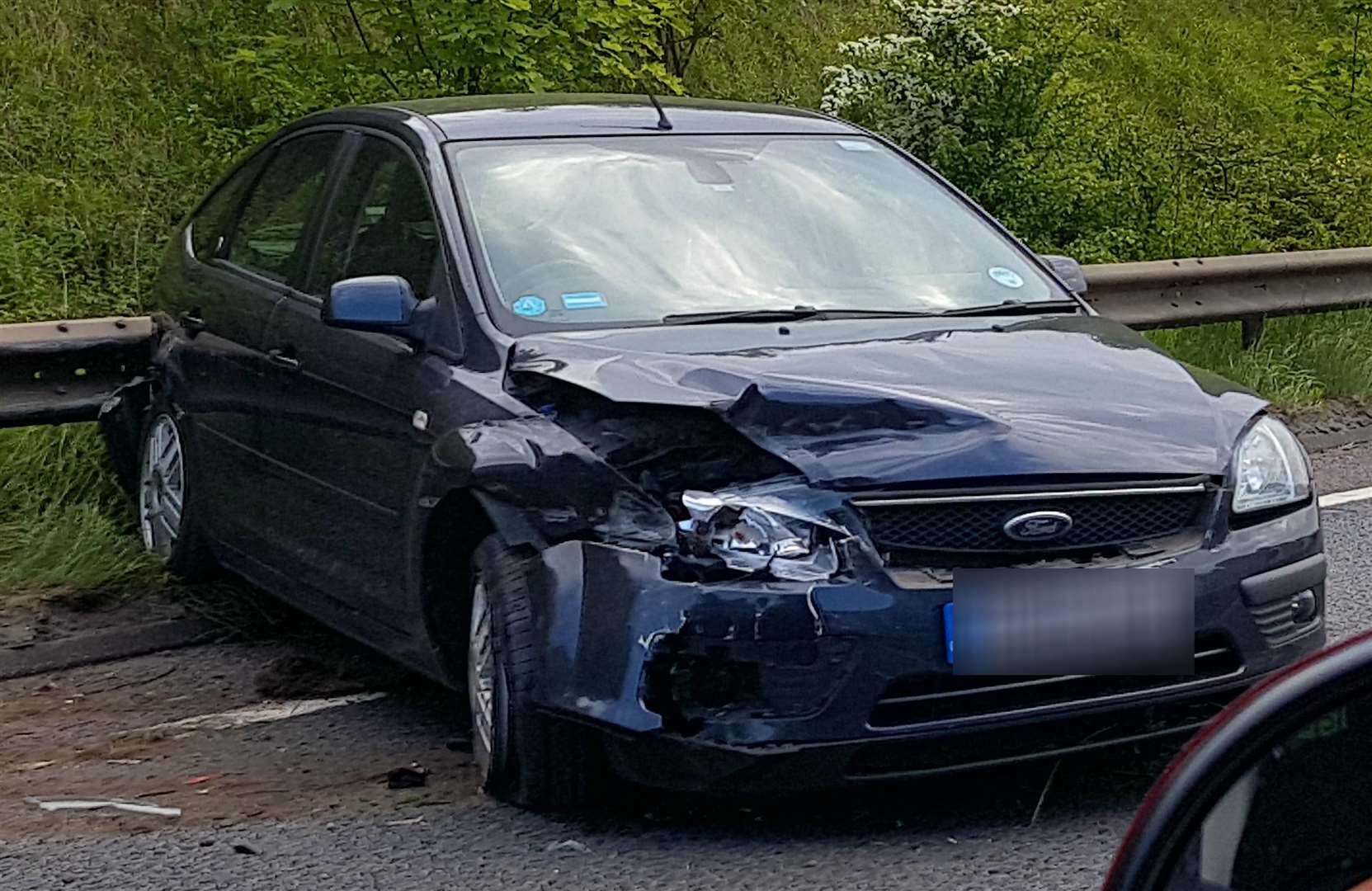 The car was badly damaged after the crash on the A20
