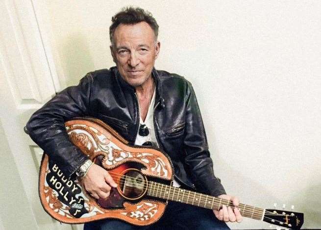 Bruce Springsteen with his Atkin guitar