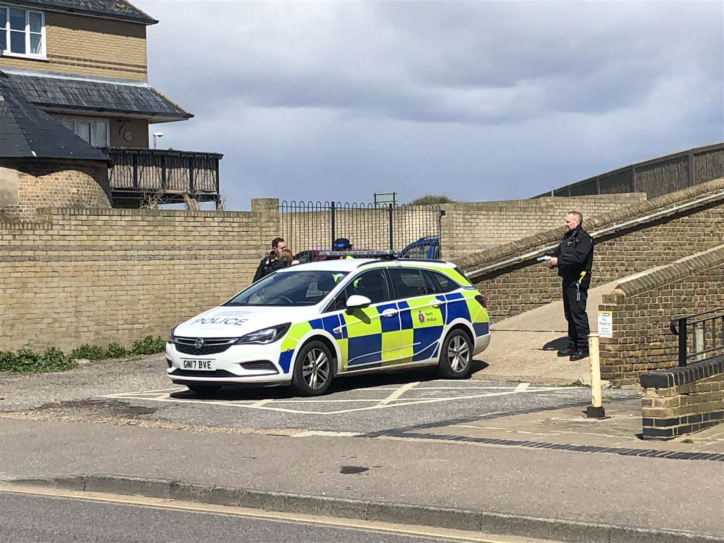 Police in Sheerness Broadway, where a cordon had been put up on the ramp to the beach, this morning