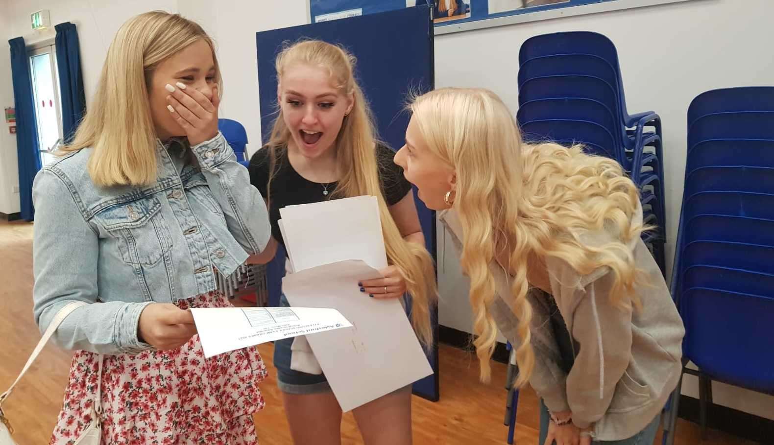 Katie Munn, Grace Lowry and Alice Knowles from Aylesford School are delighted with their grades
