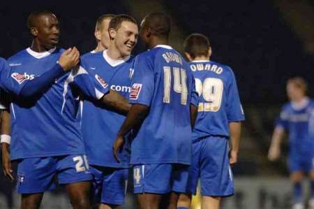 Aaron Brown celebrates with his team-mates after scoring the goal that made it 2-0