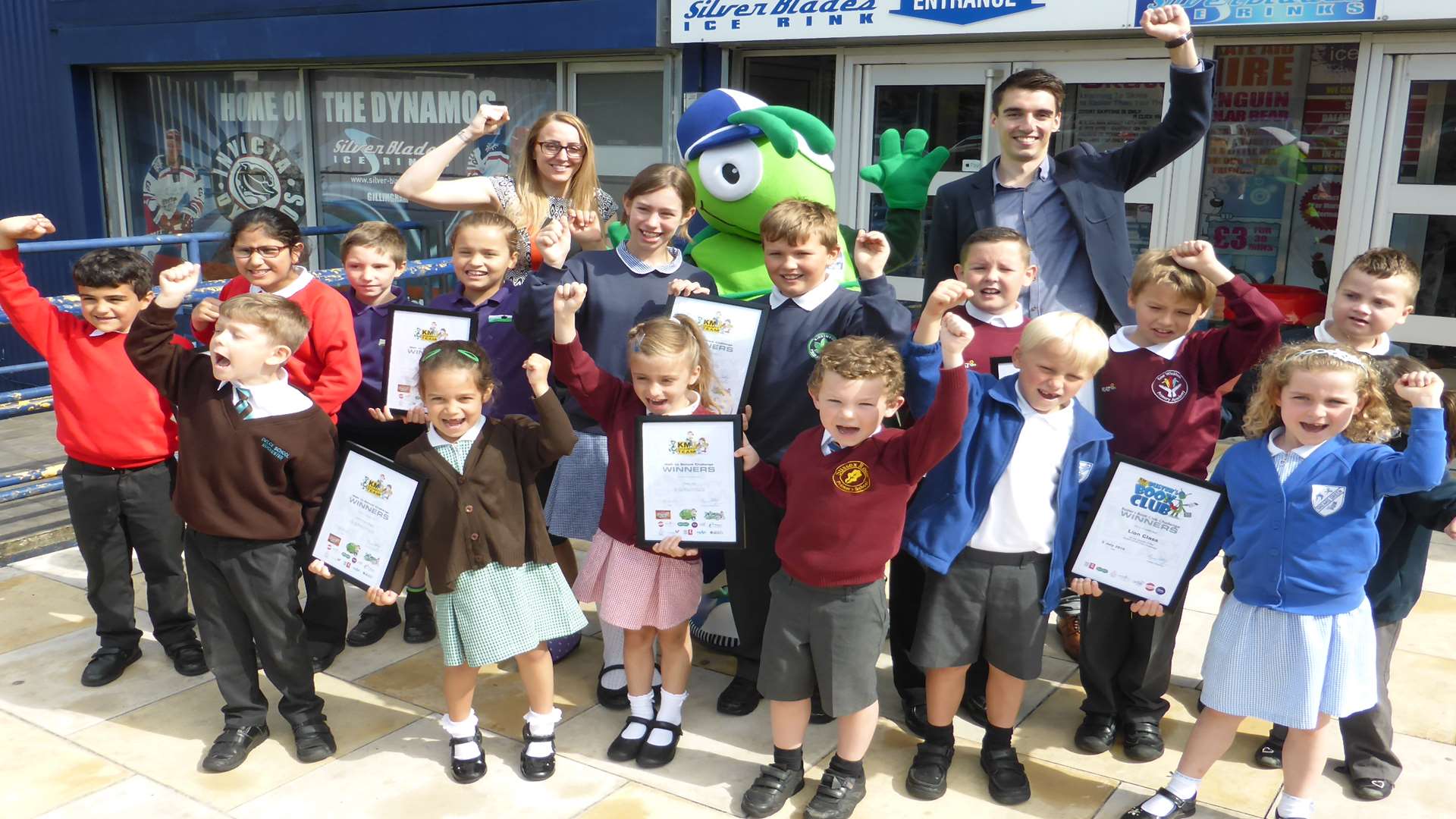KM Walk to School Summer Challenge winners celebrate success with Claire Moorehouse of Silver Blades Ice Rink and Mat Mulvey of Countrystyle Recycling.