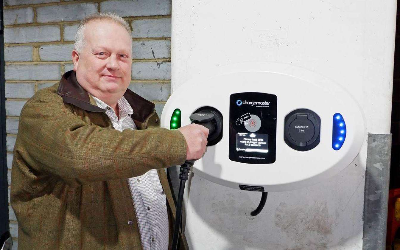 Cllr David Burton at an electrical charging point (6775803)
