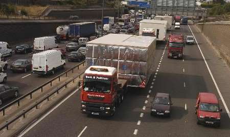 THE LONG ROAD: The convoy approaching the M25 at Dartford at the start of its journey. Picture: NICK JOHNSON