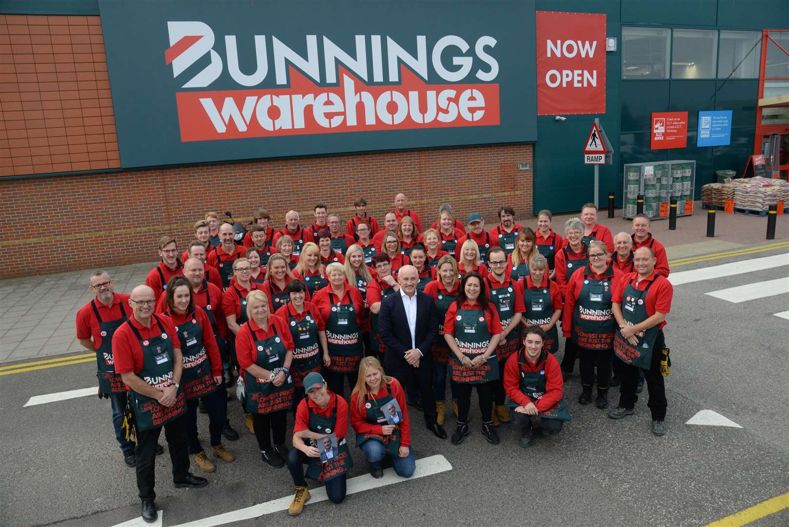 Barry McGuigan and staff at the opening of the Bunnings Warehouse on the Mill Way Retail Park, Sittingbourne
