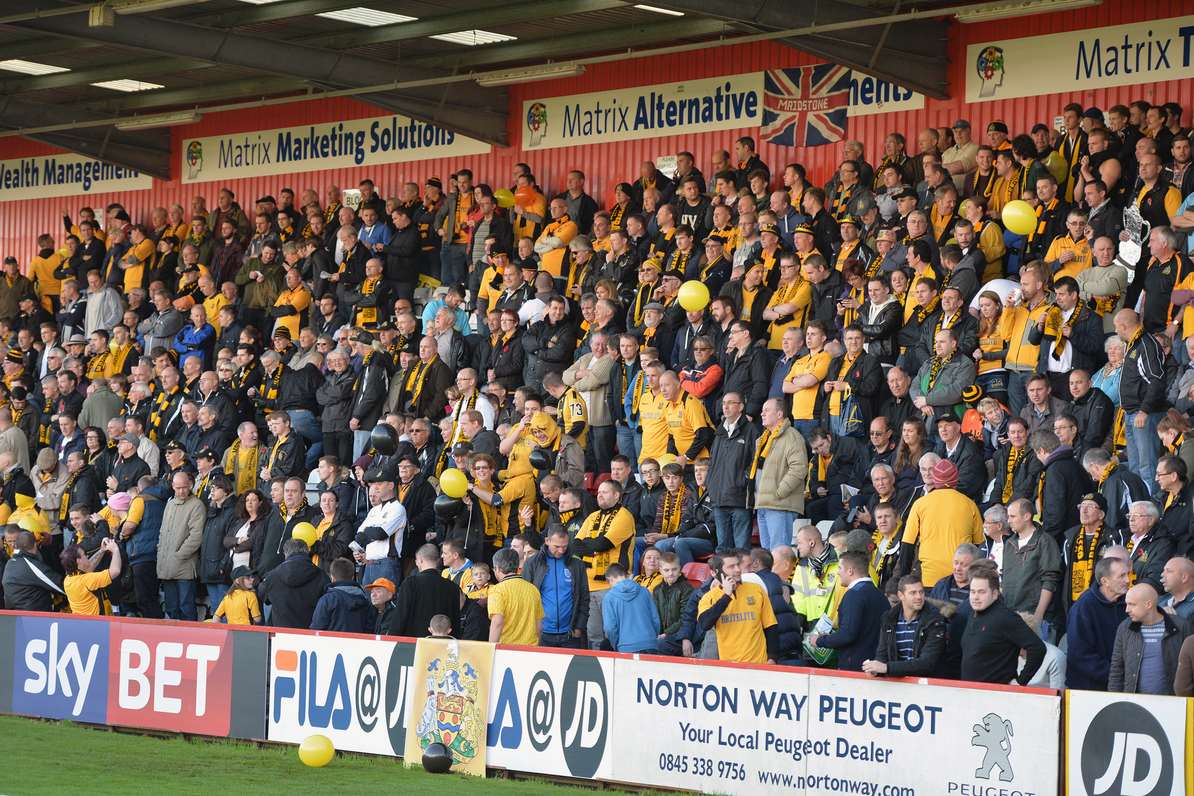 Maidstone fans in the packed away end at Stevenage Picture: Keith Gillard
