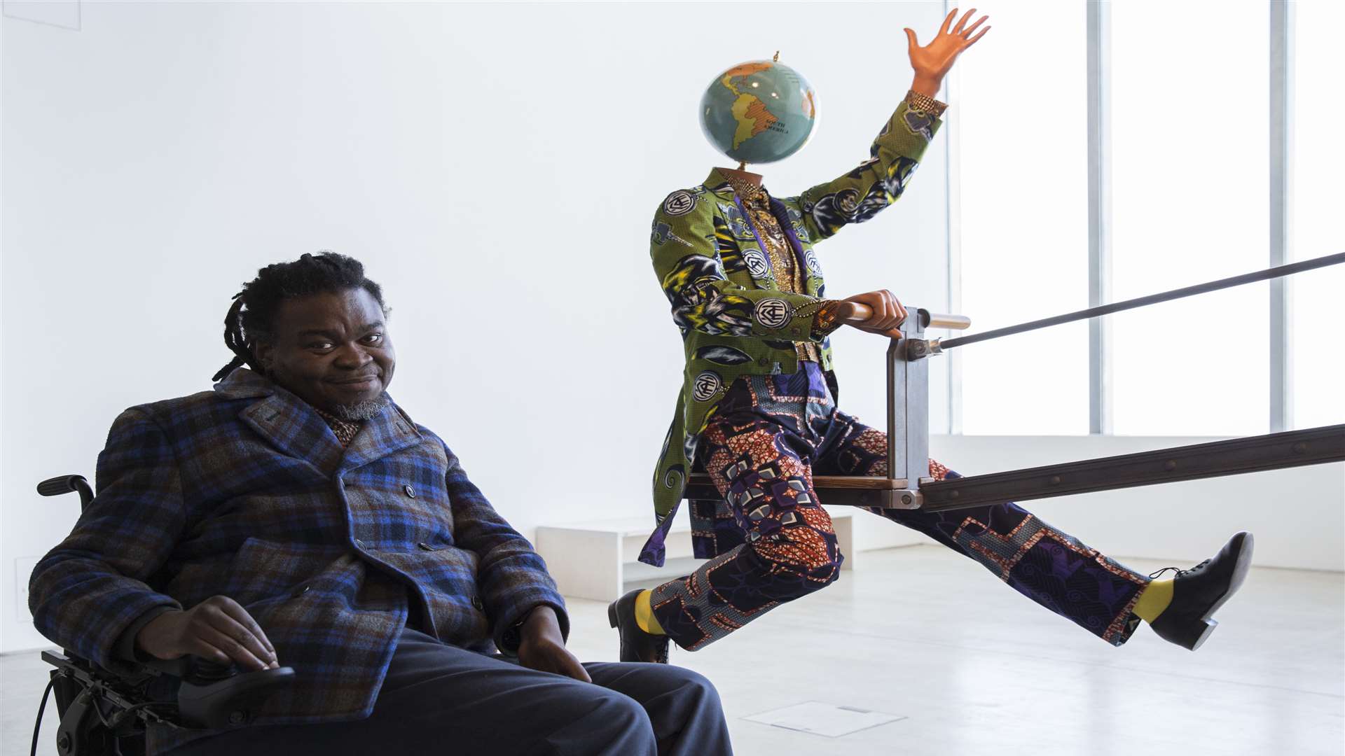 Yinka Shonibare in front of new work End of Empire, 2016 on show at Turner Contemporary. Photo: John Phillips/Getty Images for 14-18 NOW
