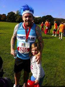 Craig Cole with his daughter Freya after completing the Big Fun Run in aid of Diabetes UK