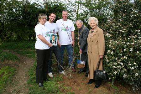 The Mayor and Mayoress of Swale Cllr Steve Worrall and Therese Davies plant a tree at the spot where Michael Chapman was killed. Sue, David and Lloyd Chapman were at the tree planting ceremony