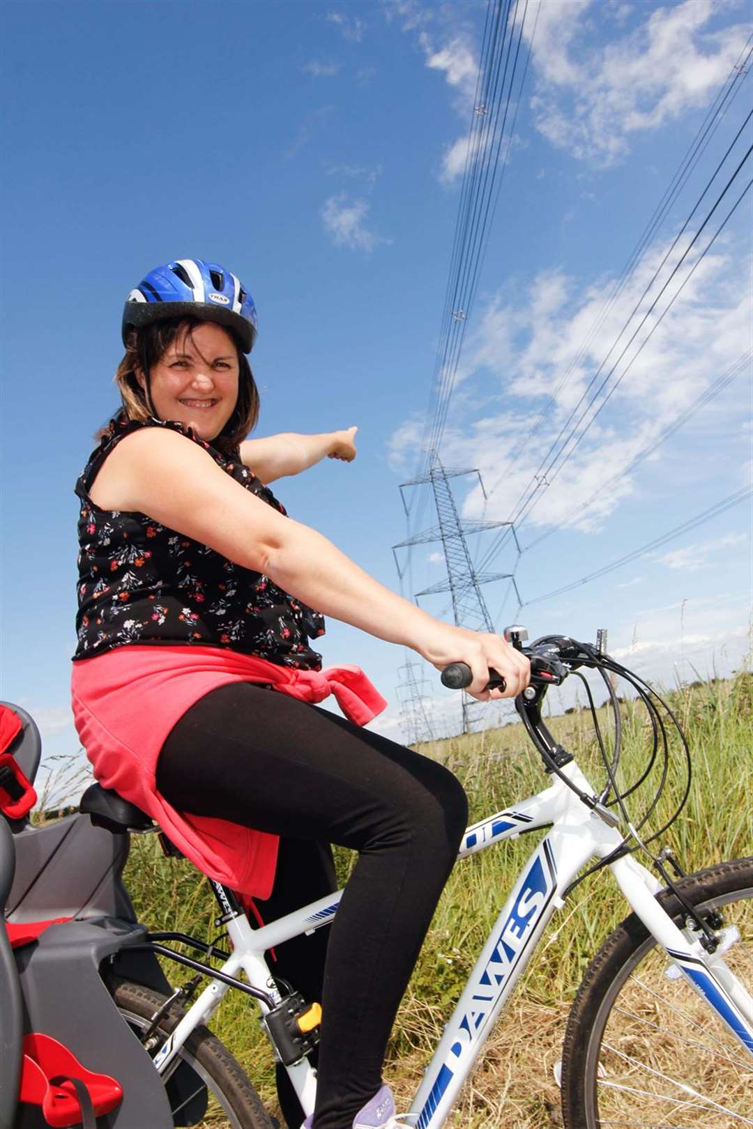 Laura Pike gets a shock from a pylon along Sheppey Way every time she cycles out of the village towards the bridge