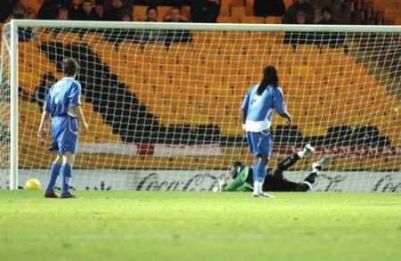 Kelvin Jack is powerless to prevent Port Vale taking the lead. Picture: MATTHEW READING