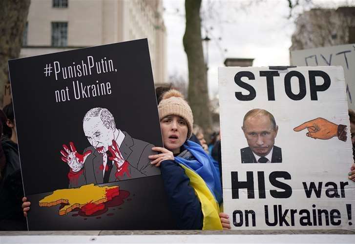 Ukrainians hold a protest against the Russian invasion of Ukraine outside Downing Street. Picture: Yui Mok/PA