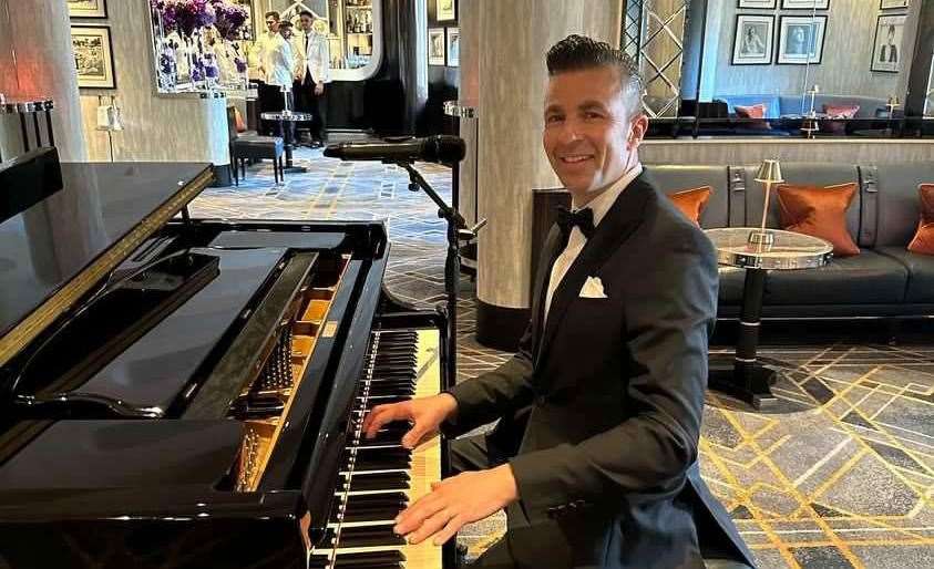 Jon Nickoll at the piano in world-famous American Bar at the Savoy Hotel