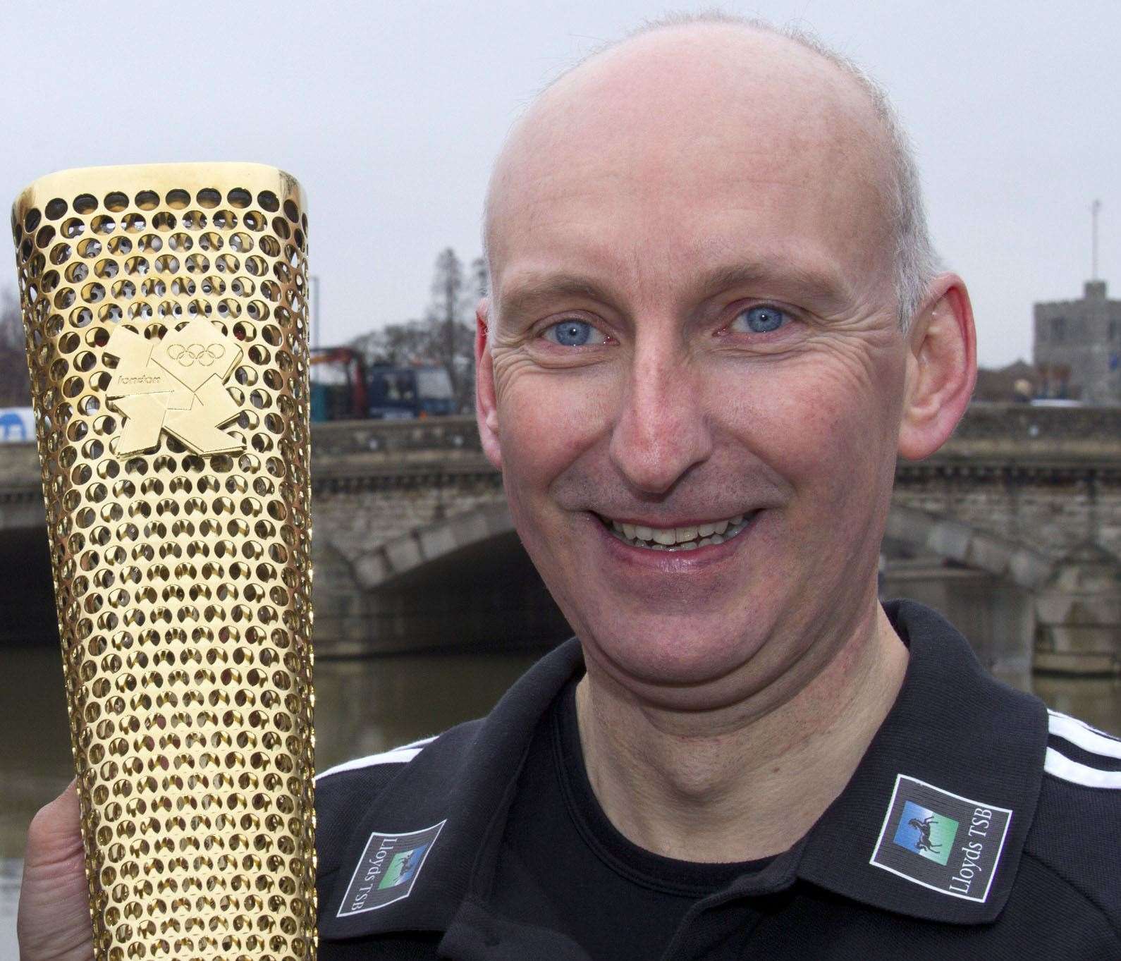 Det Sgt Melwyn Moore with the Olympic torch in 2012 Picture: Roger Vaughan